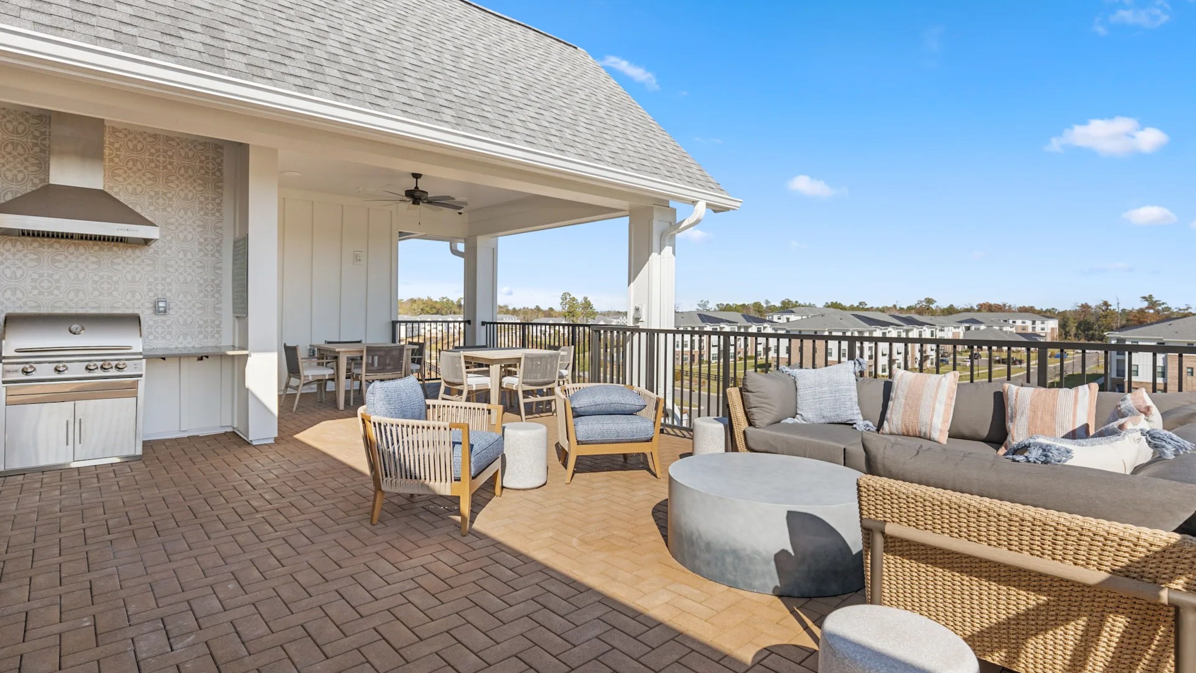 Oak Grove at Blake FarmPatio area surrounded by plants and outdoor furniture.